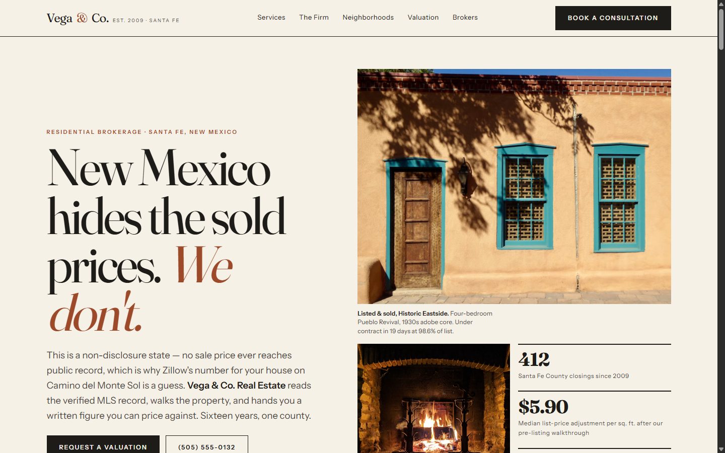 Vega & Co. Real Estate homepage: magazine-style serif layout with a rust-red accent